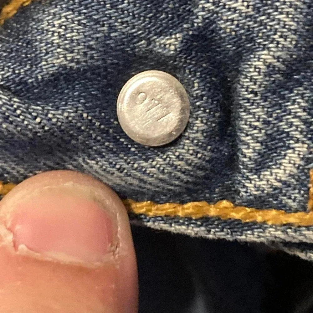 Vintage 00s Levi's 501xx button fly denim paper tag‎